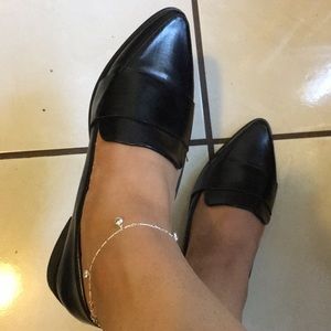Classic pointed black loafers